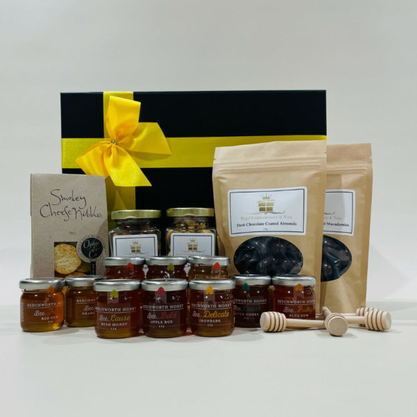 Honey Hamper image - 10 boutique honeys, dark choc coated almonds & macadamias, roasted cashews and garlic nibbles. Online or Ph 03 51744888