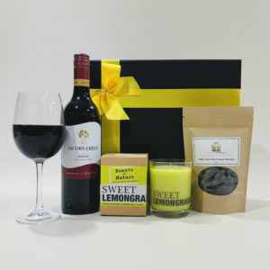 Gift Hamper For Friend, Lemon grass soy candle, Jacob Creek classic merlot and chocolate coated almonds, to enjoy.