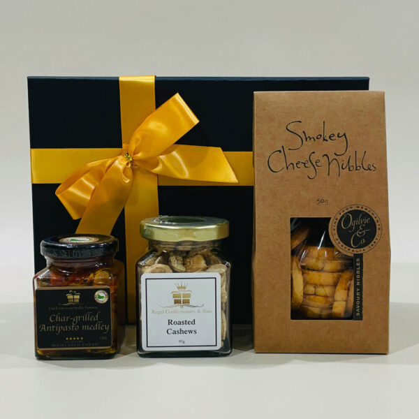 A deluxe treat box Includes Smokey Cheese Nibbles, Antipasto Medley, cashews, or chocolates. Perfect for gift giving.