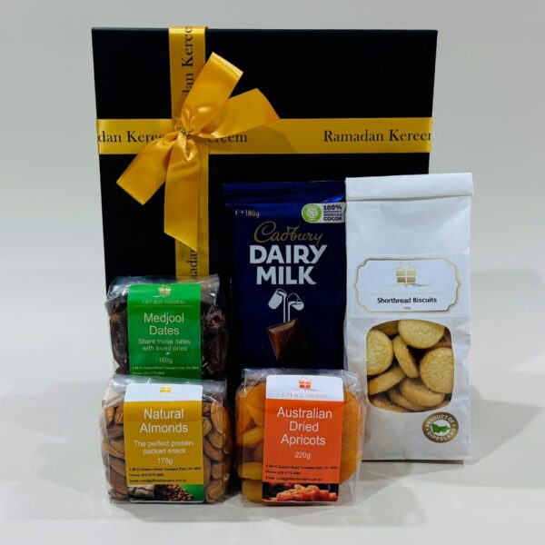 Eid gift box with Ramadan treats: dried fruits nuts, cookies & Chocolate. Spread the joy of Ramadan with delightful surprises. Eid Mubarak!