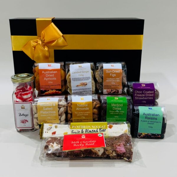 A festive gift box filled with chocolate coated nuts, dried fruits, candies, and more for Purim celebrations.